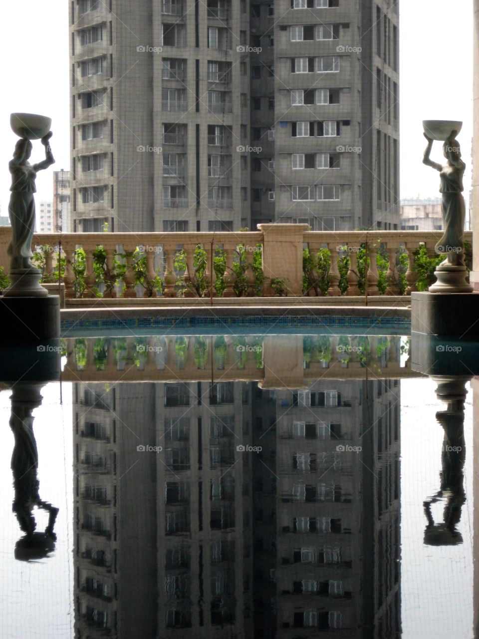 India. Reflections Carrying Water