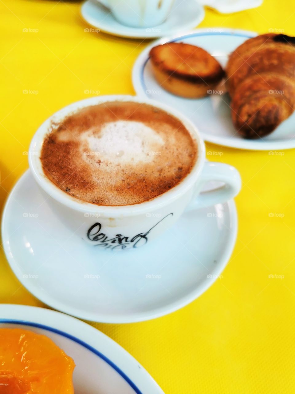 Coffee table served eat tasty view day outdoor outside street capture cafe restaurant
