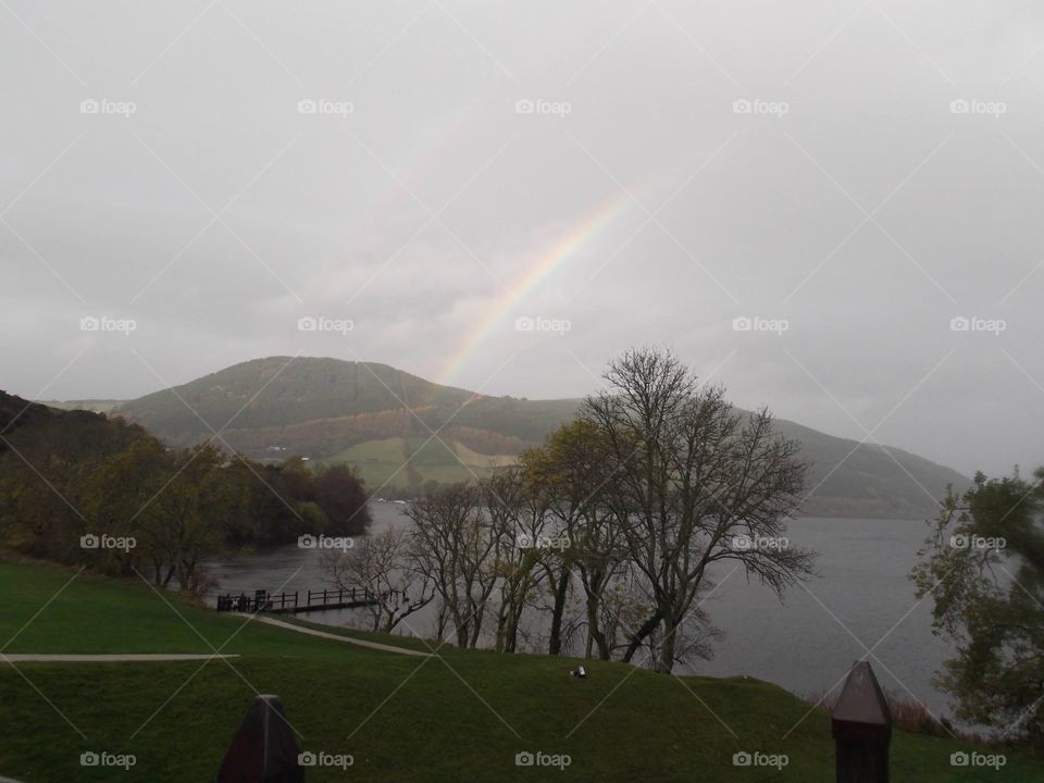 Rainbow over the grounds of Castle Urquhart, on the banks of Loch Ness, Scotland