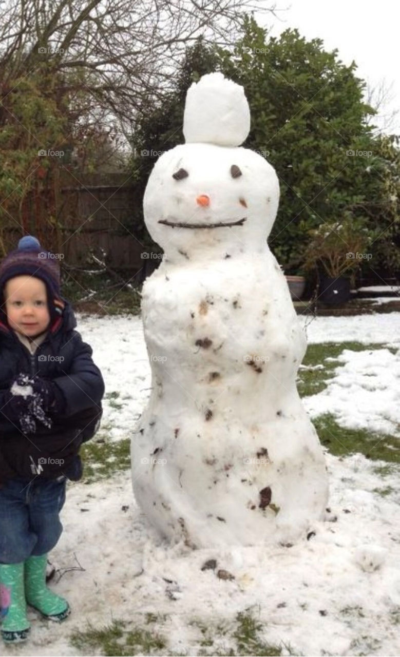Snowman in English garden