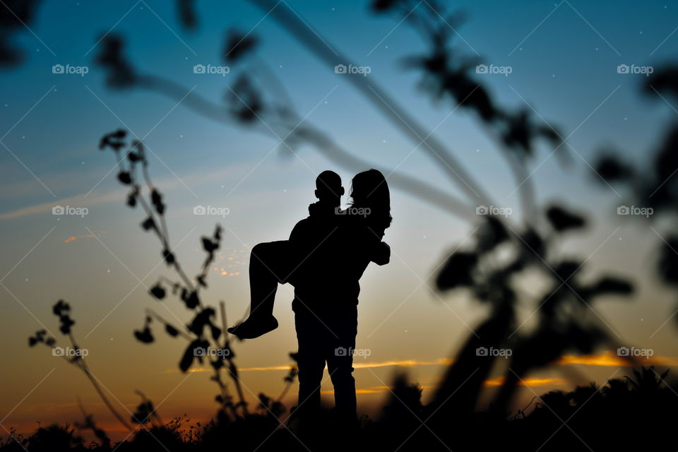 Silhouette of a couple at sunset