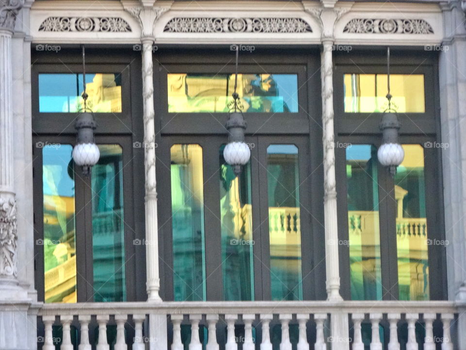 reflection on an old building in Madrid