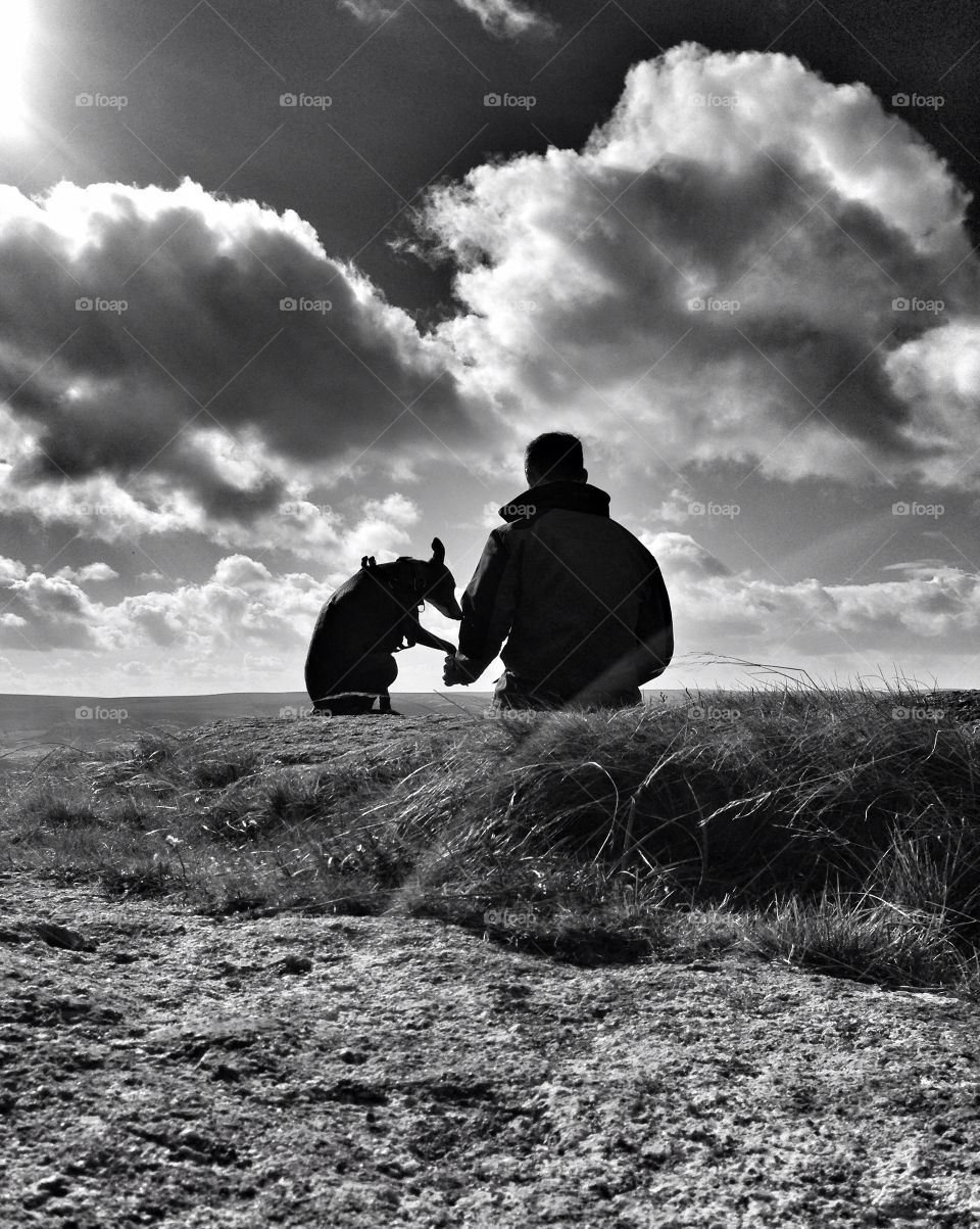 Mans best friend. Man and dog take a rest