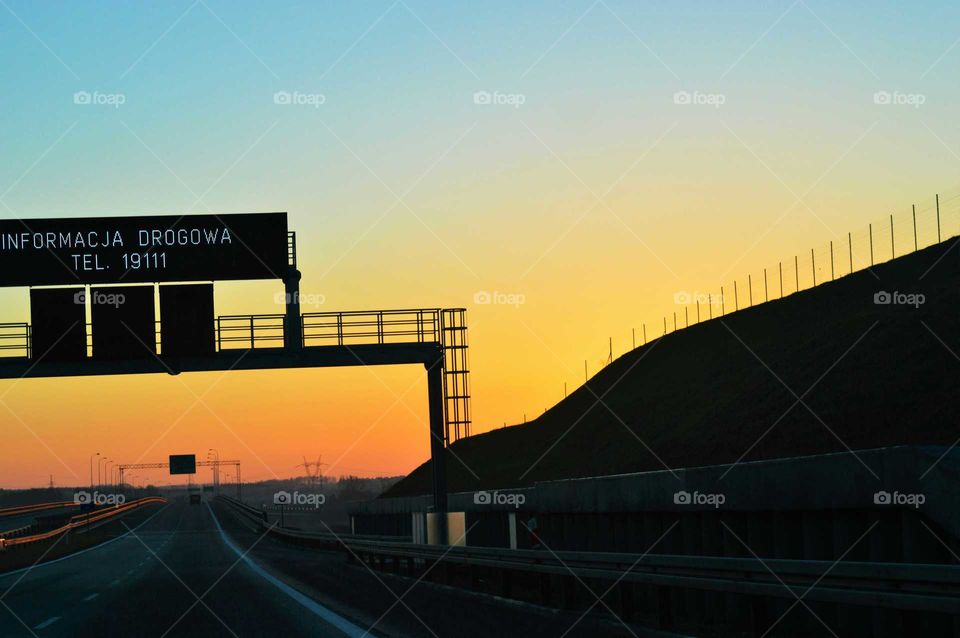 Golden Hour in a hightway with road signs, Lublin, Poland
