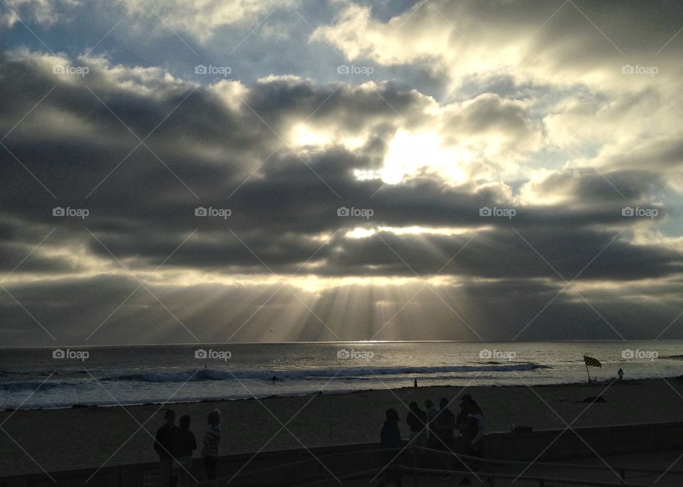 Pacific Beach against storm cloud