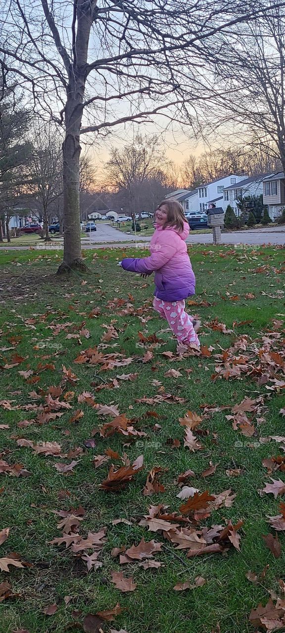 playing in leaves