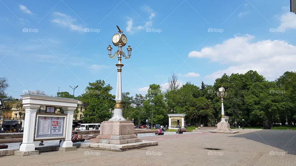 city landscape with clocks