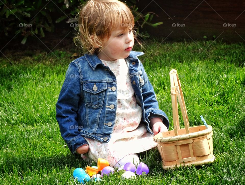 Girl With Easter Basket. Young Girl Hunting Easter Eggs
