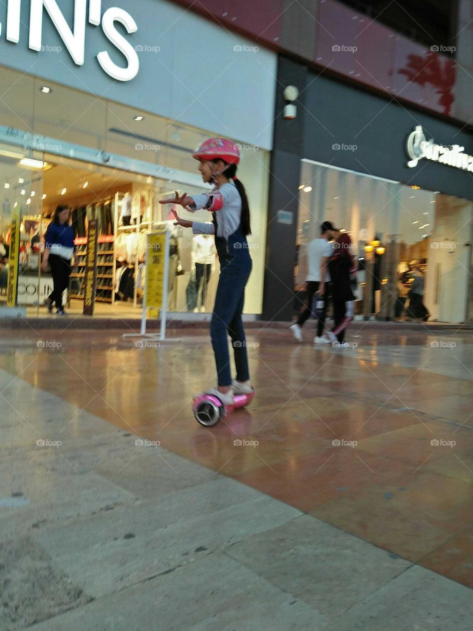 A child on electric skate.