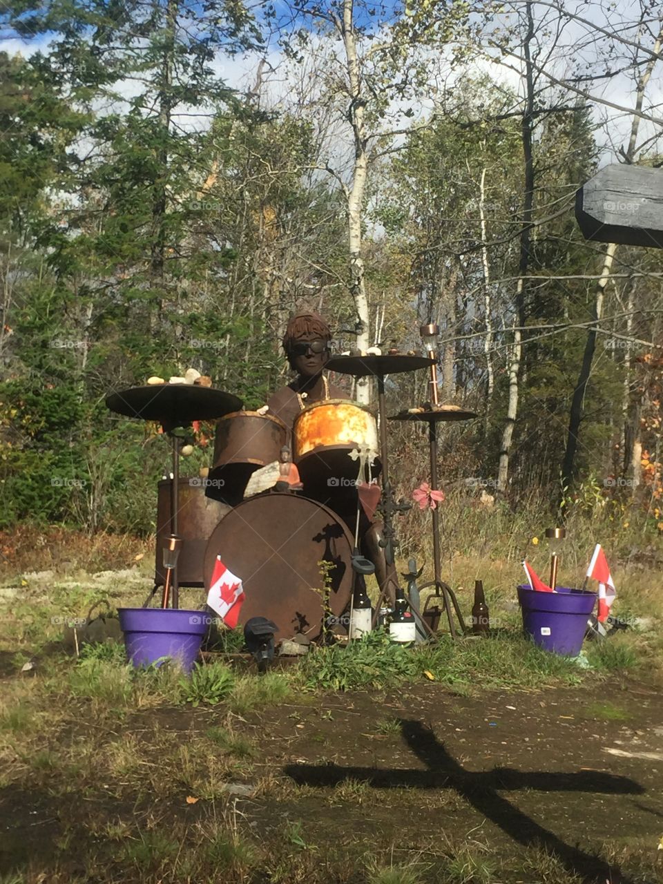 Monument to a young man on the roadside