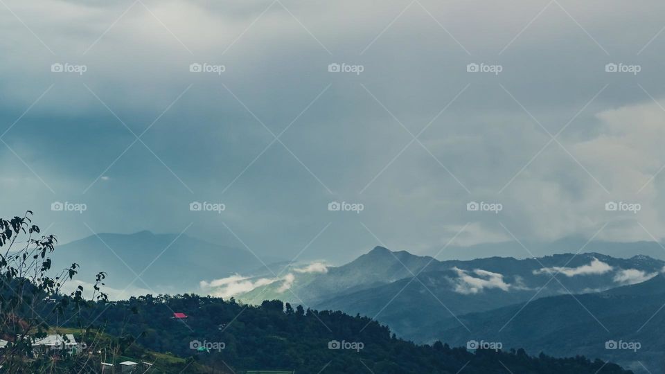 Sudden change in the weather conditions creating an atmospheric mood on the mountain ranges of Ukhrul, Manipur, India