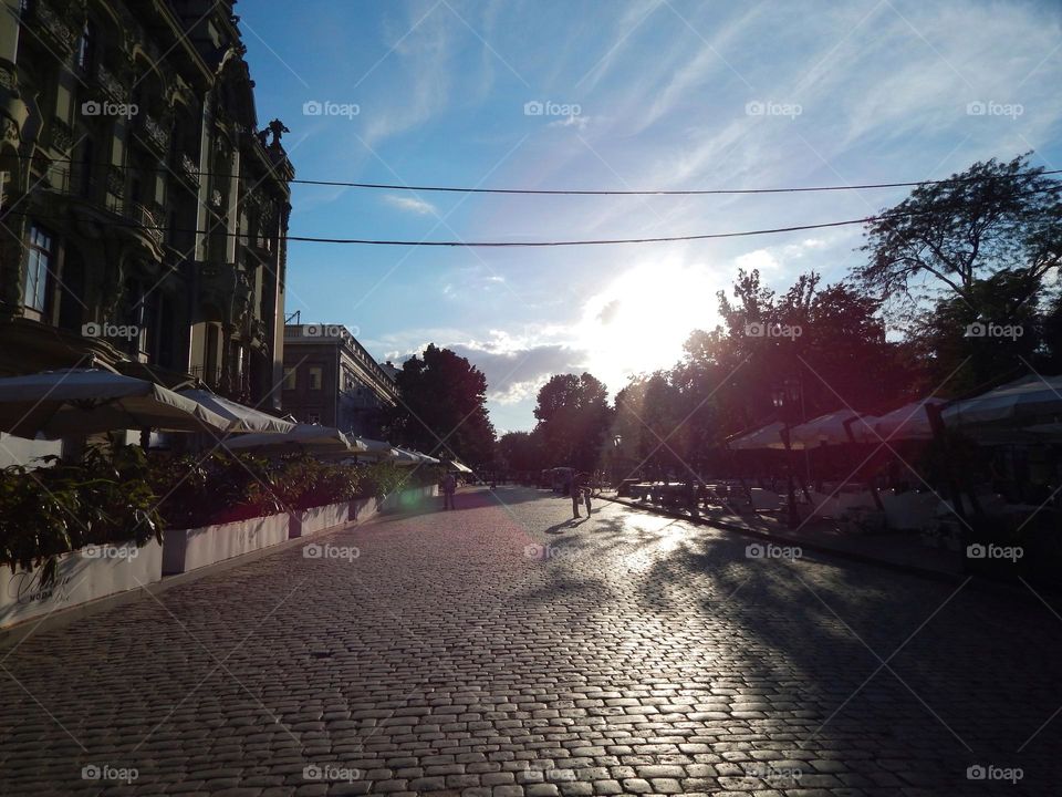 paving stones sunset on Deribasivska Street