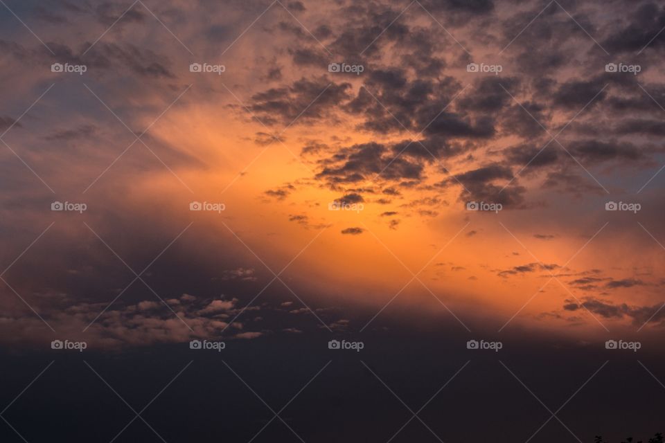 Sunset between the dark clouds