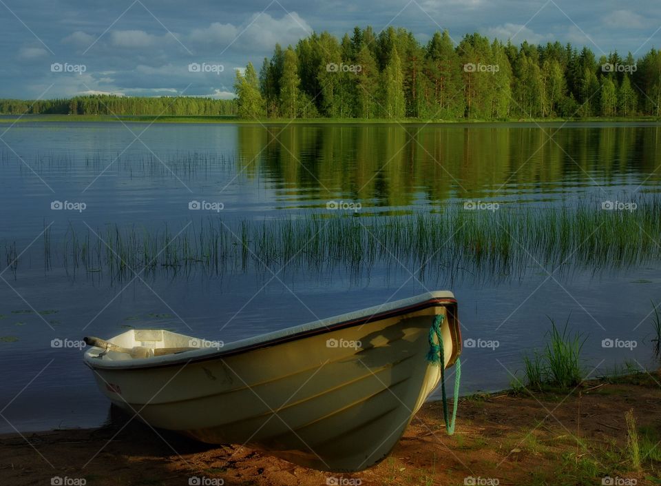 Evening boat. . Took this shot in beautiful Finland. Love to spend a couple of weeks in a cabin down by a lake. 