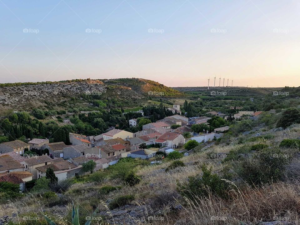 wiew over Fitou village with windmills in background