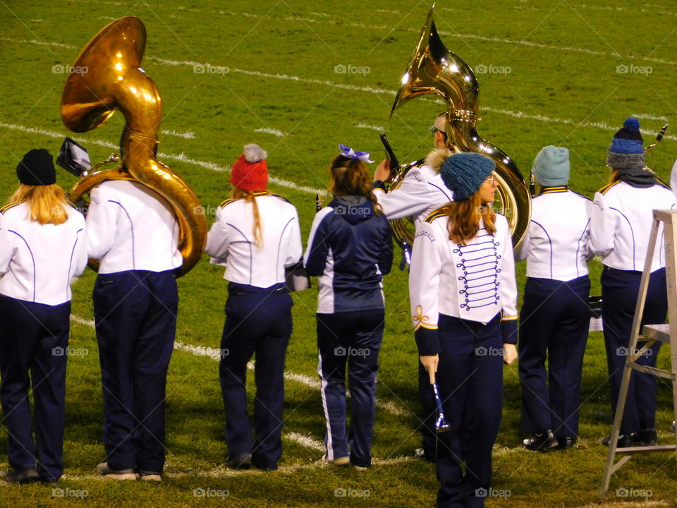 waiting for half time to play sousaphone in the marching band