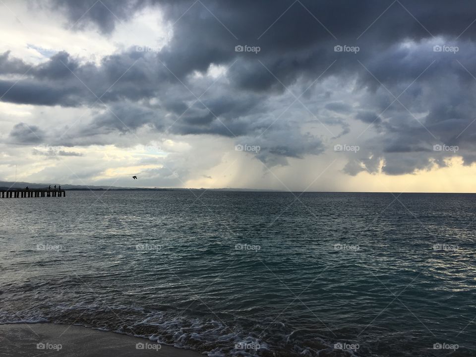 Gloomy and dark beach in Puerto Rico anticipating a storm arrival 