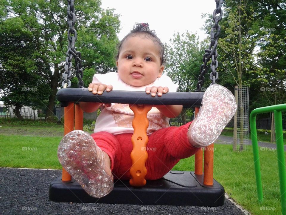 On the swings in the park 
