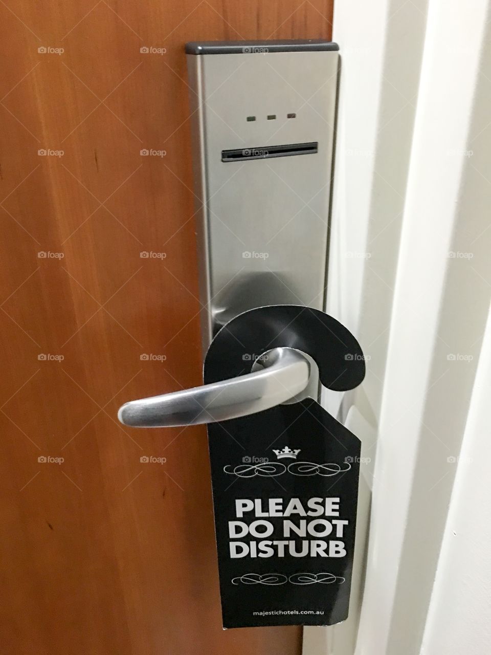 Do not disturb sign on door in luxury hotel