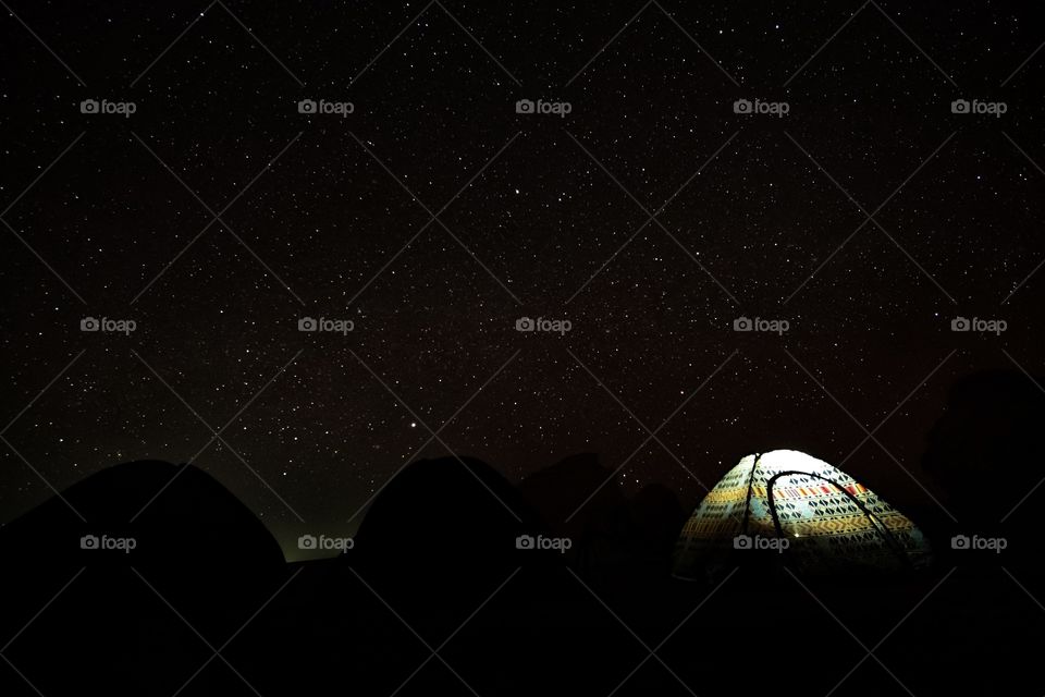 Family are Camping under million stars at White desert in Bahariya Oasis , Egypt 