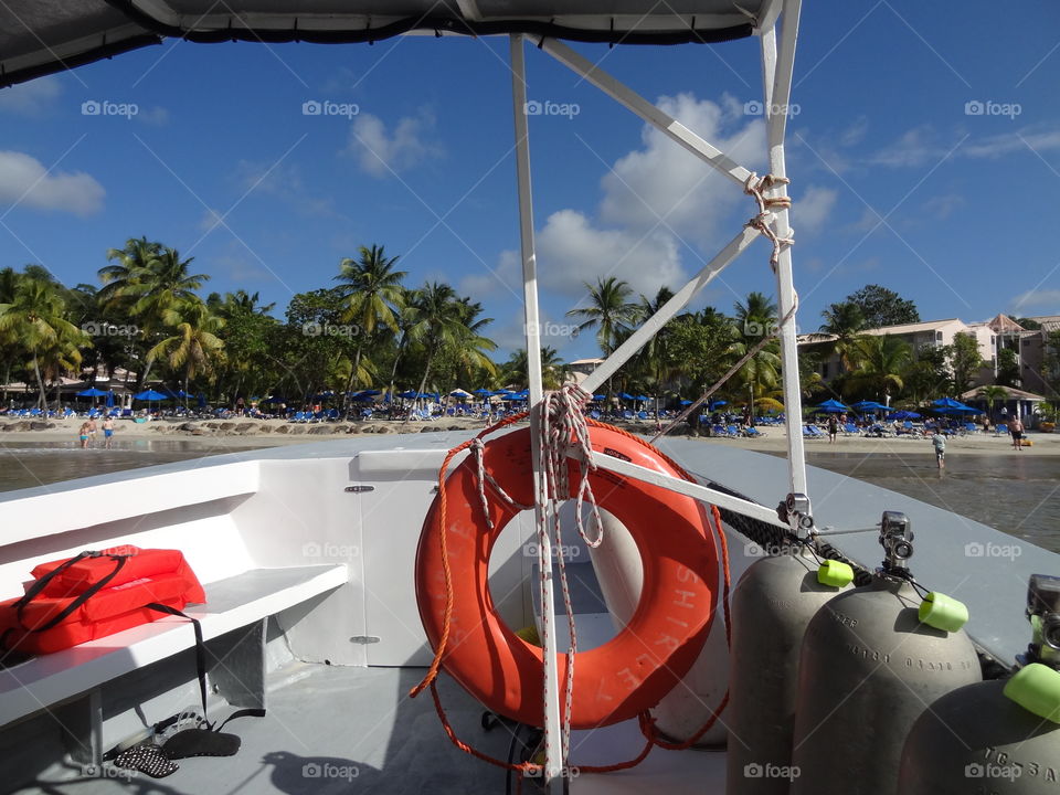 The Dive Boat. After the diving trip, off the beach in St Lucia