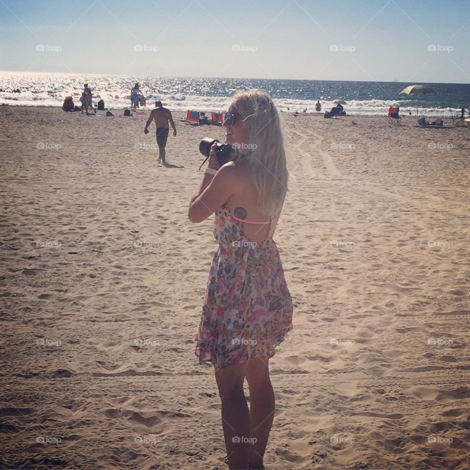 Beach Babe Photos. Caught taking picture 