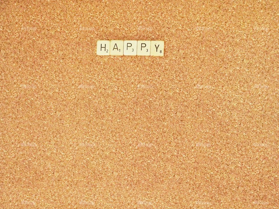 scrabble words on cork board