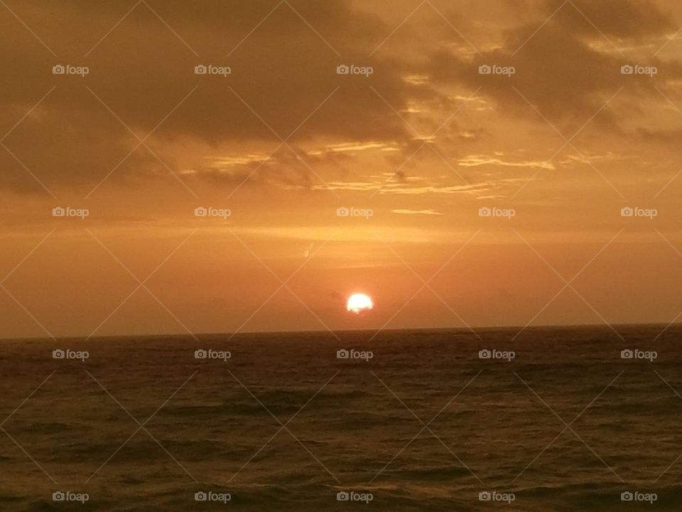 cloudy Morning sunrise on Hollywood Beach; South Florida