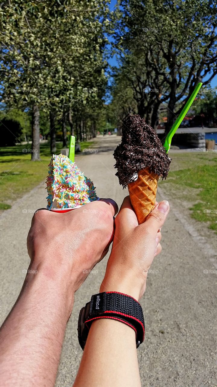 Summer favourites!. Hands holding our favourite icecream!