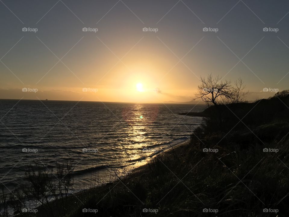 Illuminated ocean by sunlight 