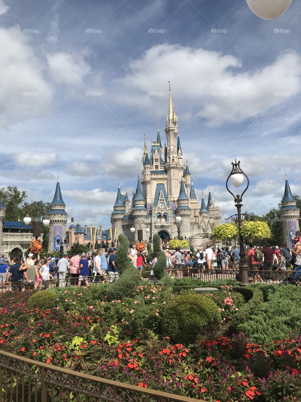 Fun at Disney world next to Cinderella Castle