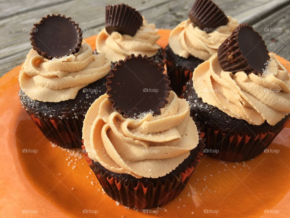 Chocolate Cupcakes with Peanut Butter Buttercream Icing topped with a Peanut Butter Cup