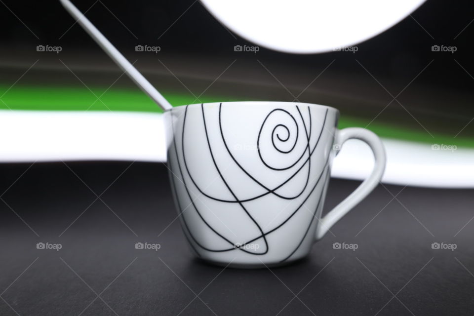 Cup of coffee with light effect
