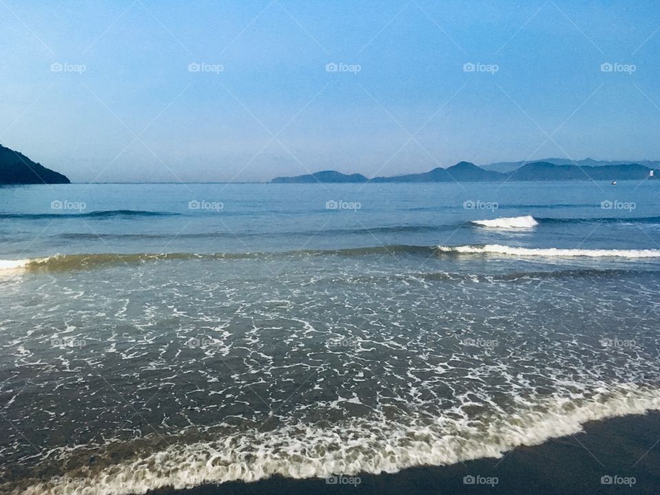 Amanhecer na Praia de Santos. Aqui é a “Ponta da Praia”! O mar está calmo e a paisagem muito bonita. Brasil 🇧🇷