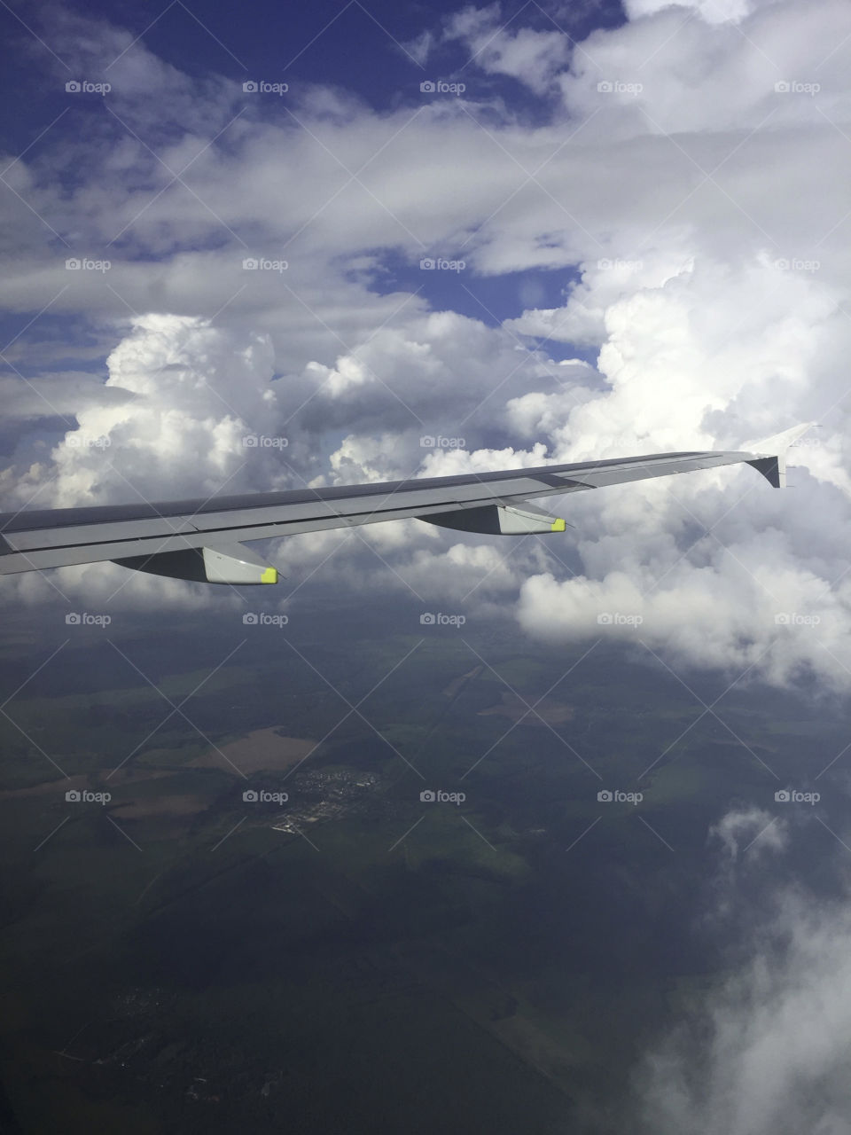 Sky view over plane wing