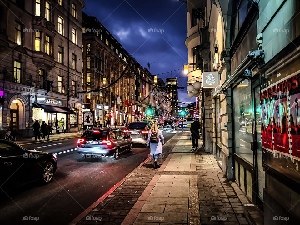 Stormy sky but busy street.