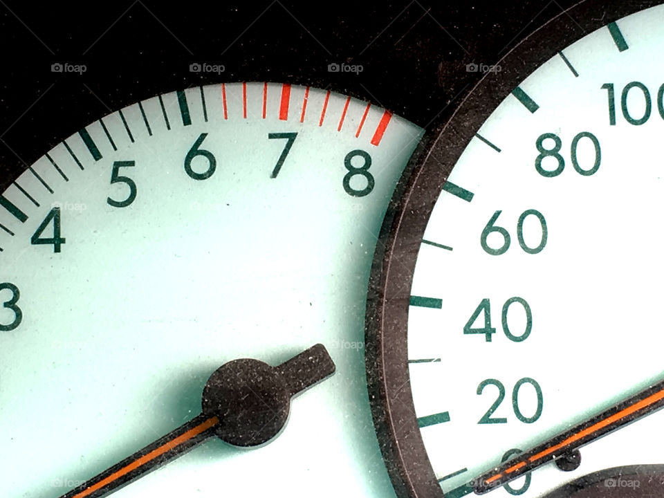 Car odometer and speedometer closeup