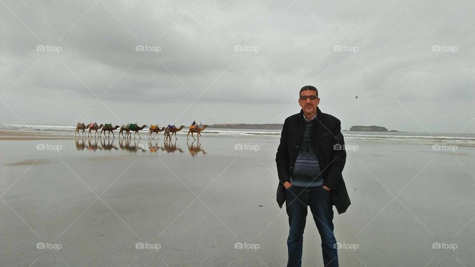 I and behind me a caravan of camels.