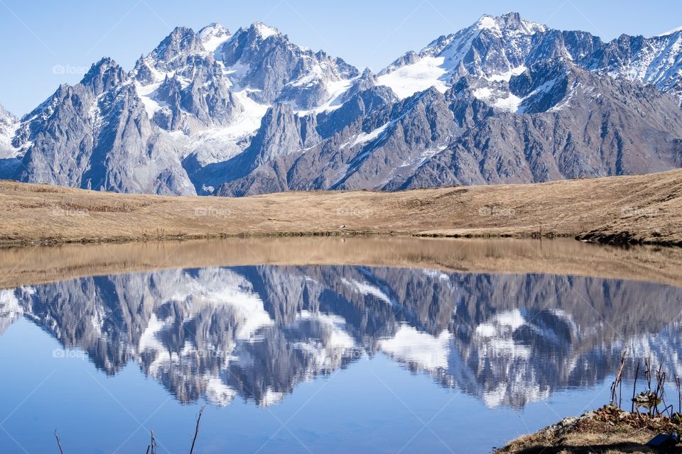 Beautiful reflection in Koruldi lake at the foot of Caucasus mountain , Georgia new landmark for tourists 