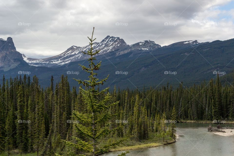 View of lake and mountains in winter