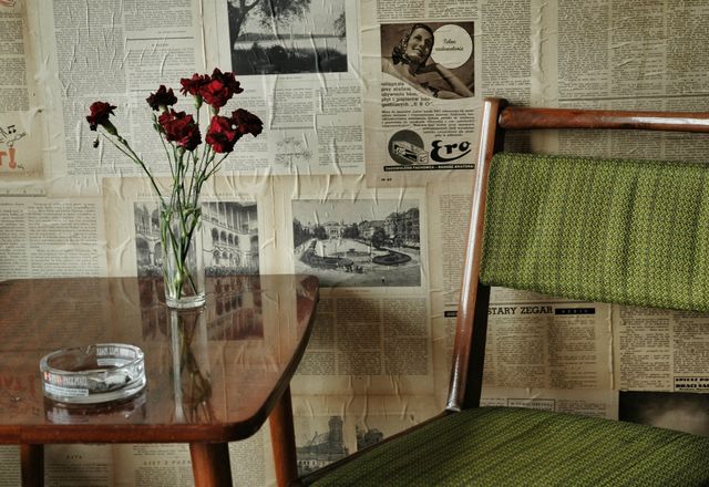 Old cafe. Flowers standing on the table,  vintage design  cafe