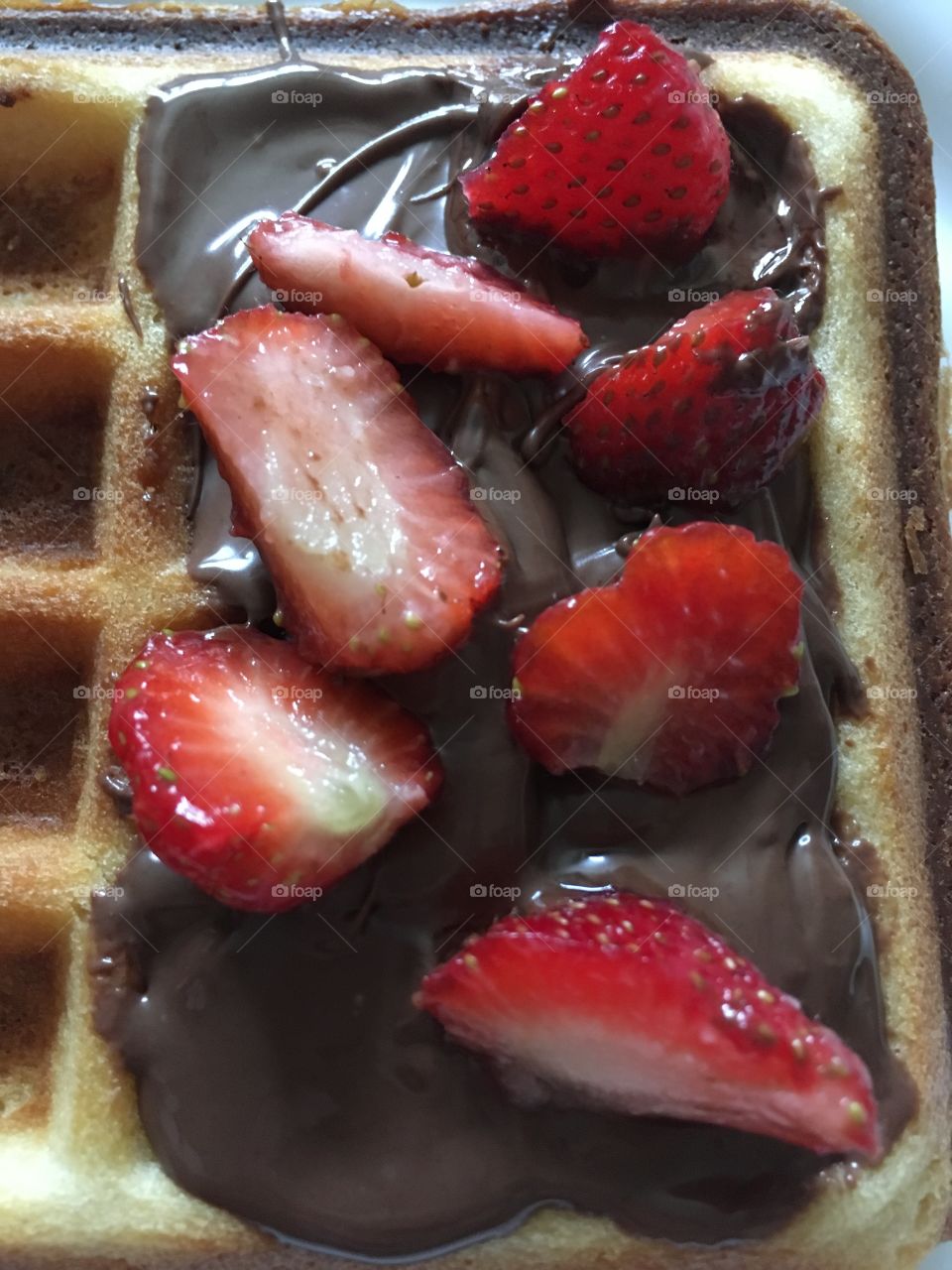 Delicious Nutella and strawberry filled waffle