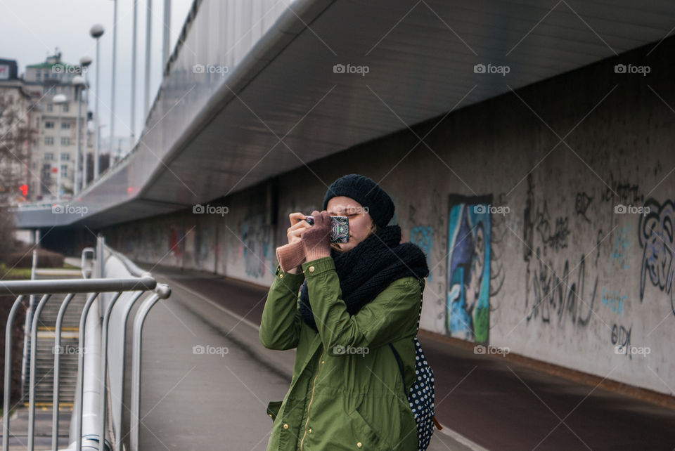 Close-up of woman with mobile phone