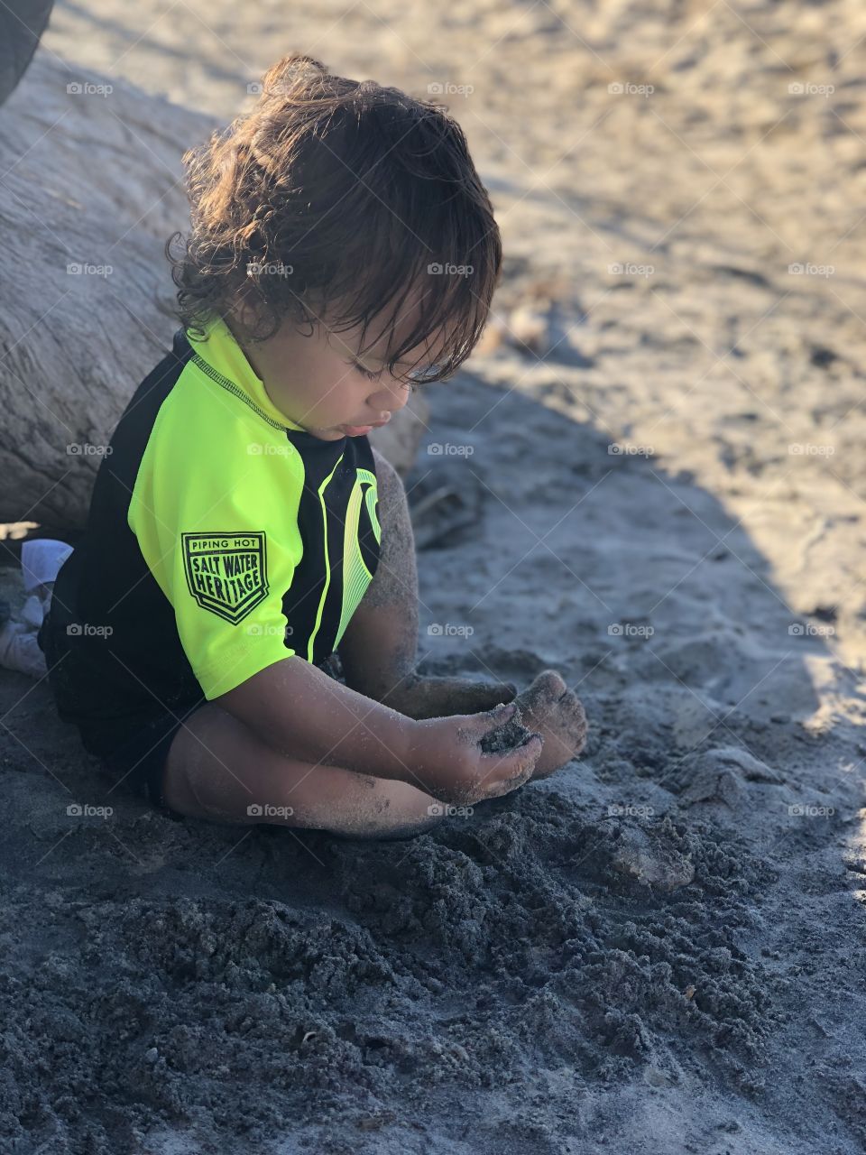 Child playing in sand