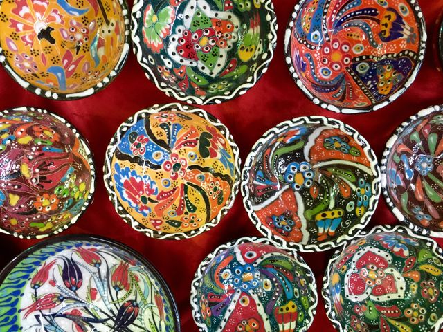 Old souk in Dubai selling colourful small bowls 