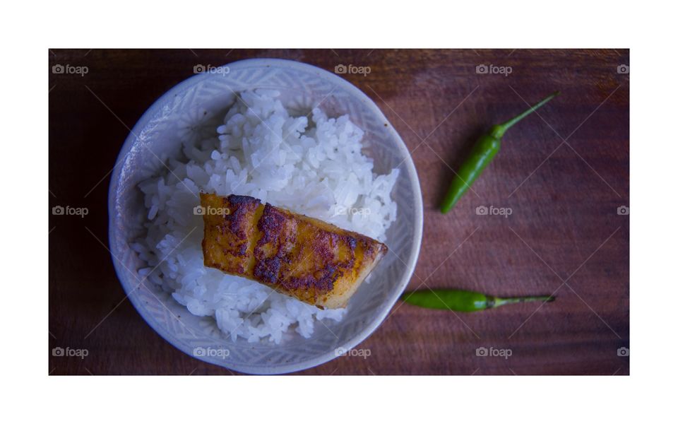 Dried fish with steamed rice