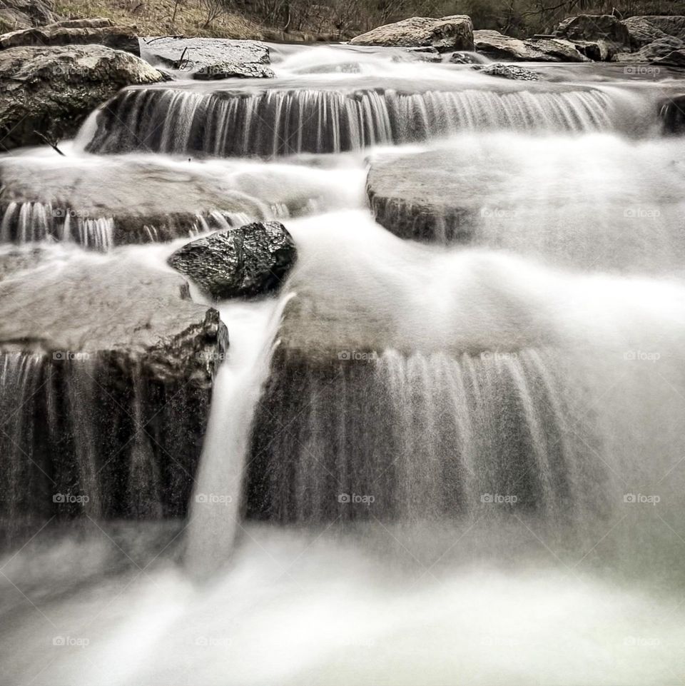 Long exposure water on rocks 