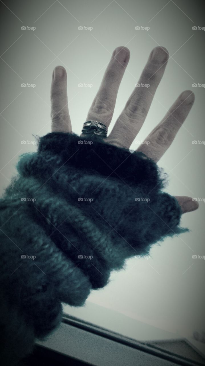 ring on hand with wrist warmers