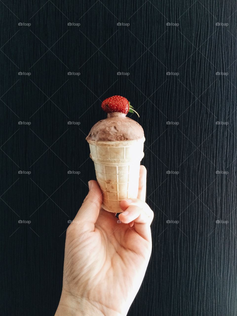 Strawberry ice cream with black background