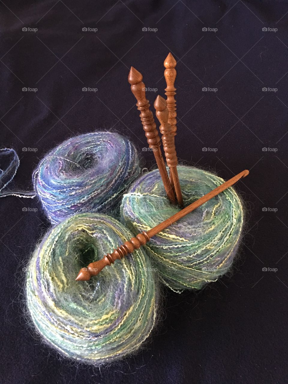 Yarn with wooden crochet hooks 